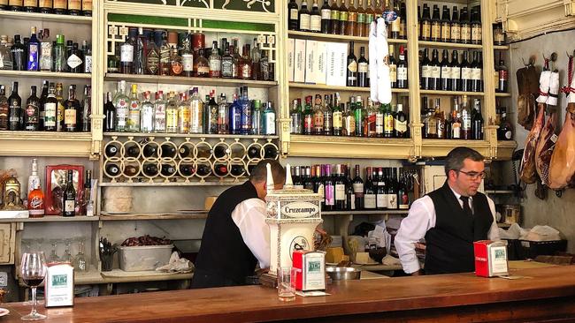 Staff in El Rinconcillo, a historic bar in Seville. Picture: Christine McCabe