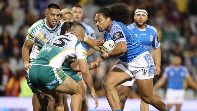 Samoa’s Bunty Afoa charges into the Cook Islands’ defence. Picture: Mark Kolbe/Getty Images