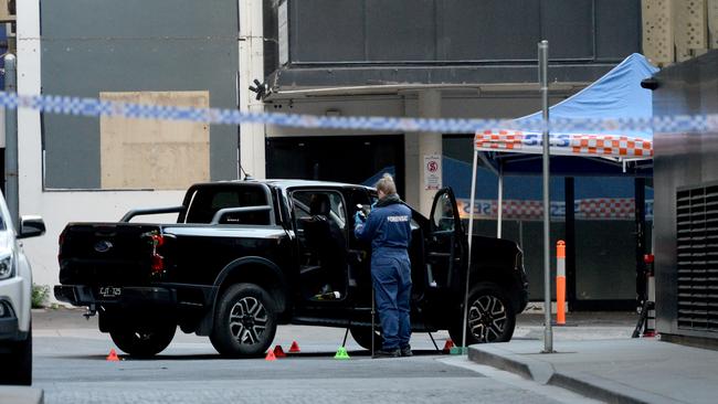 A black ute was being fingerprinted. Picture: Andrew Henshaw