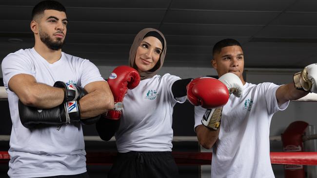 Taha Ahmad, Tina Rahimi and Alex Winwood pose during the Australian 2022 Commonwealth Games Boxing Team announcement at Brotherhood Boxn Gym. Pic: Mark Kolbe/Getty Images