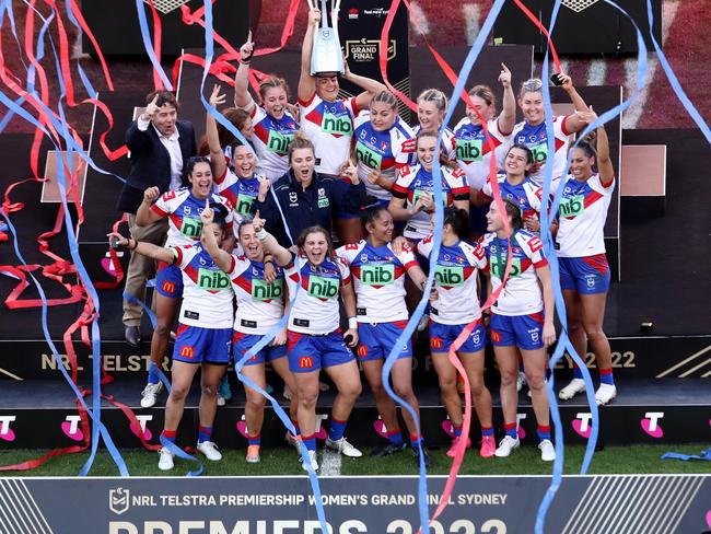 SYDNEY, AUSTRALIA - OCTOBER 02: Knights players celebrate with the Premiership Trophy after winning the NRLW Grand Final match between Newcastle Knights and Parramatta Eels at Accor Stadium on October 02, 2022 in Sydney, Australia. (Photo by Jason McCawley/2022 Getty Images)