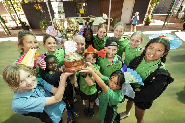 South Newman Primary School and Jimmy Cassidy check out the prized trophy in WA. Picture: Colin Murty