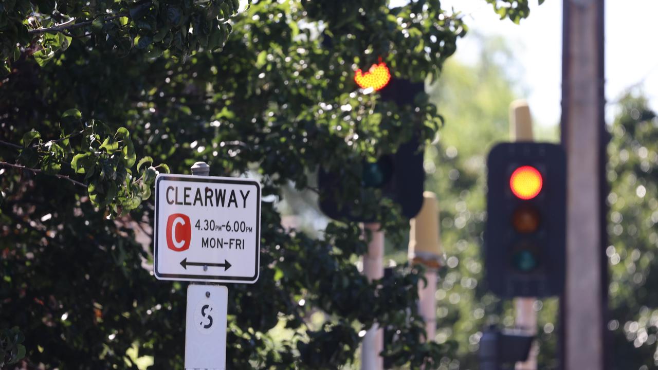 Marryatville High School pedestrian crossing lights on Kensington Road partially covered with tree foliage. Picture: Russell Millard