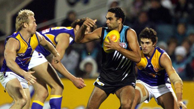 Footballer Michael Braun tires to catch Burgoyne.