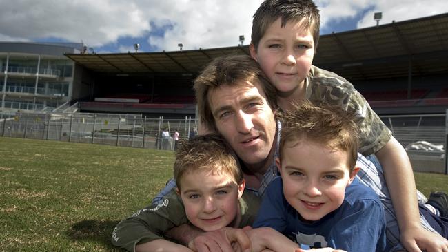 Western Bulldogs' Scott West pictured with sons, including Rhylee (8), who is training with the Bulldogs and Cooper and Kobi (5).