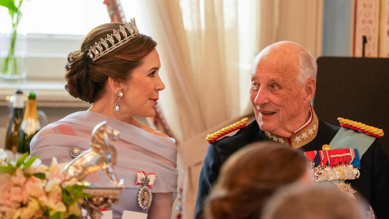 King Harald V of Norway (R) and Queen Mary of Denmark speak during the gala dinner. Picture: Heiko Junge / NTB / AFP / Norway OUT