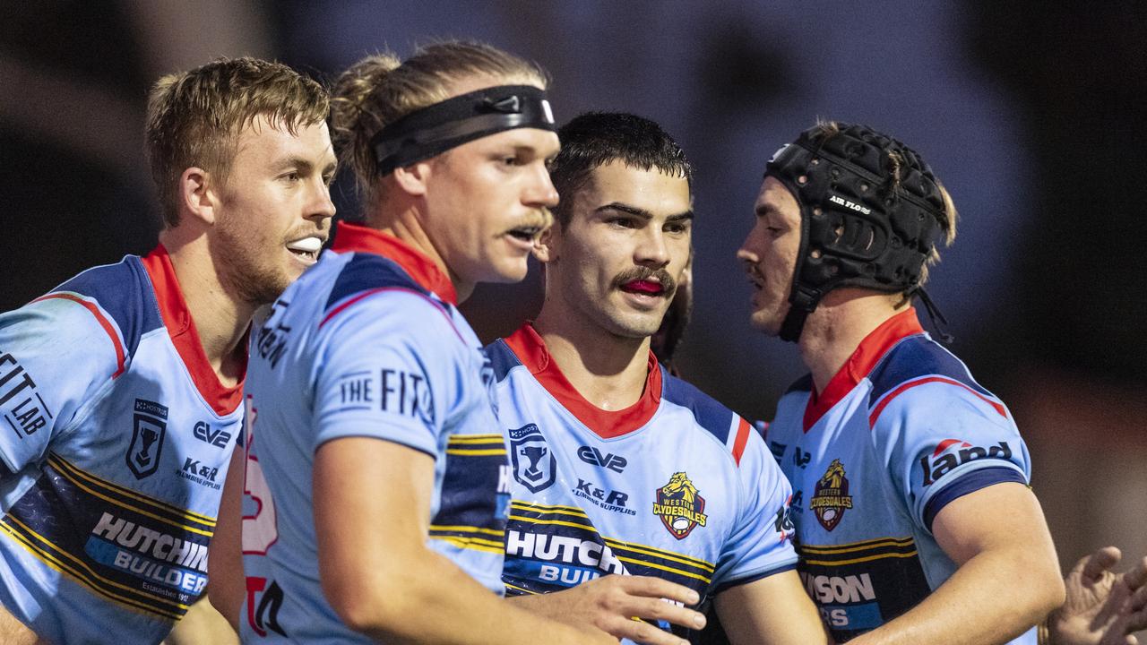 Western Clydesdales players (from left) Jordan Lipp, Mitchell Watson, Brock Diment and Drew Timms celebrate a Jordan Lipp try against Northern Pride in Hostplus Cup rugby league at Clive Berghofer Stadium, Saturday, May 13, 2023. Picture: Kevin Farmer.