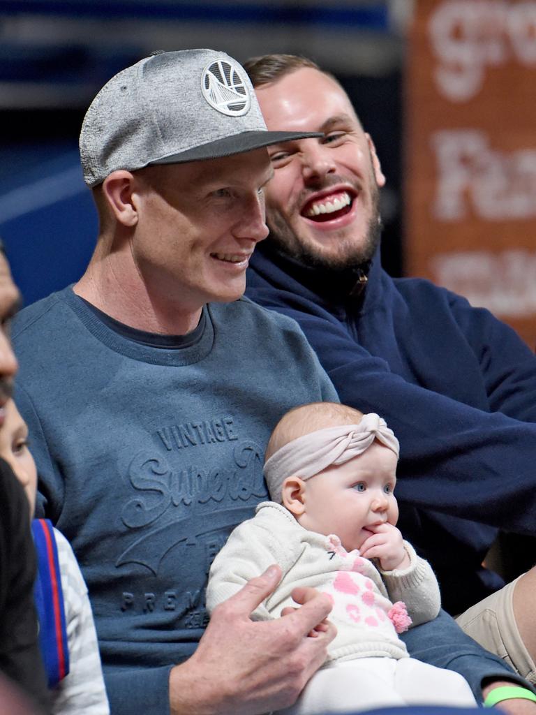 Chalmers and Sam Jacobs together watching courtside as the Adelaide 36ers play. Picture: Naomi Jellicoe