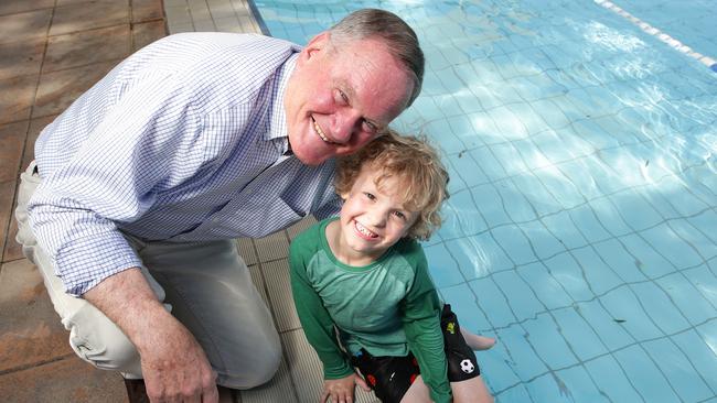 New Unley acting mayor Peter Hughes with grandson Toby at the Unley Swimming Centre. Source: File