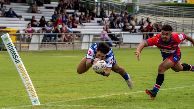 Brothers winger Cameron Bundock dives over for one of his two tries in the Rugby League Ipswich Reserve Grade qualifying final against Rosewood at the North Ipswich Reserve. Picture: Bruce Clayton