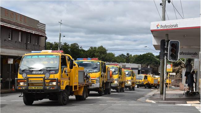 Rural Fire Brigade trucks in Mary Street, Gympie after the floods. Photo: Elizabeth Neil