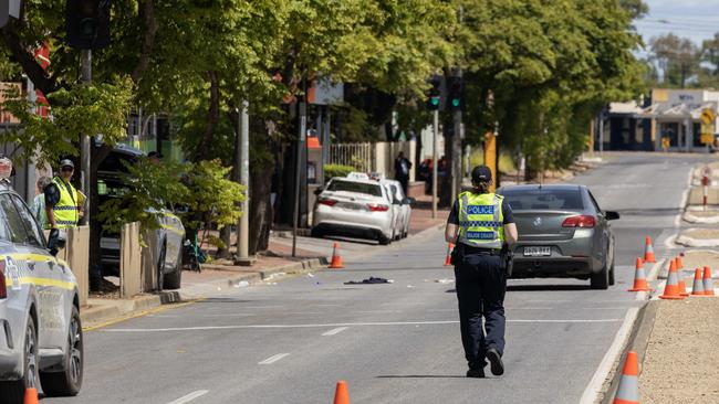 Police at the scene of Woodville Rd, Woodville South after a crash between a car and a pedestrian. Picture: NCA NewsWire / Kelly Barnes