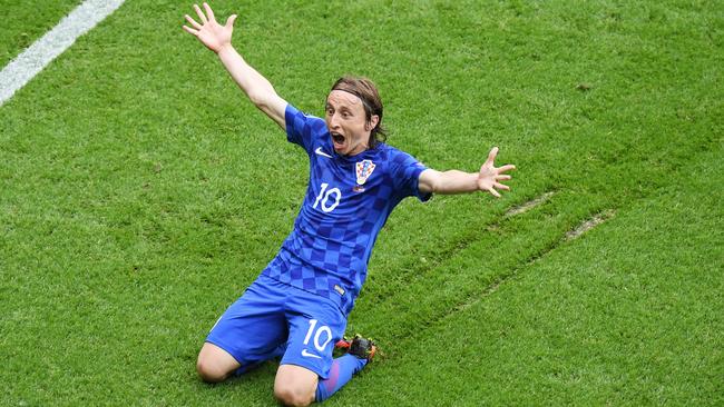 Luka Modric of Croatia celebrates scoring.
