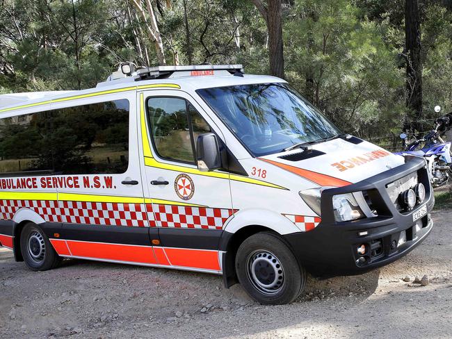 An ambulance leaves a remote property with Mr Baihn on board after he was found  alive and well after being lost since Sunday in dense bush land near Sandy Hollow in the upper Hunter region. Picture by Peter Lorimer.