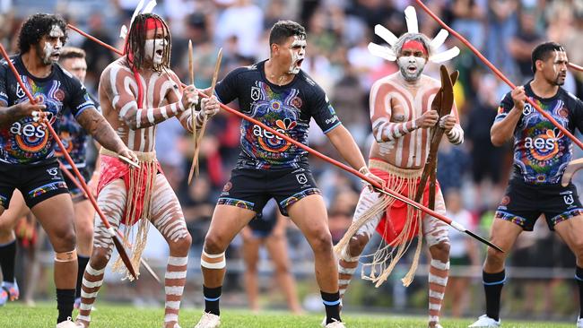 Latrell Mitchell of the Indigenous All Stars performs an Indigenous war dance ahead of the 2023 NRL All Stars match between Indigenous All Stars and Maori All Stars at Rotorua International Stadium on February 11, 2023 in Rotorua, New Zealand. (Photo by Hannah Peters/Getty Images)