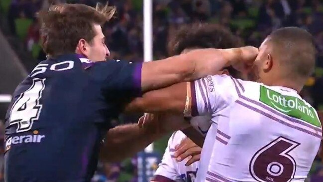 Curtis Scott lands a punch on Dylan Walker during his Melbourne days.