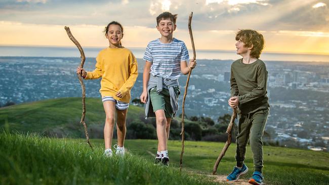 Edward 11, Hudson,5, and Chloe, 8, enjoying the great outdoors at Mount Osmond lookout. Picture: Tom Huntley