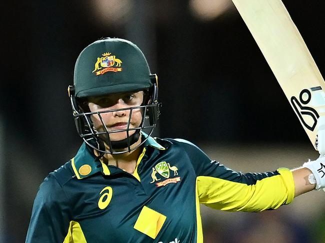 MACKAY, AUSTRALIA - SEPTEMBER 19: Phoebe Litchfield of Australia celebrates her half century during game one of the Women's T20 International Series between Australia and New Zealand at Great Barrier Reef Arena on September 19, 2024 in Mackay, Australia. (Photo by Albert Perez/Getty Images)