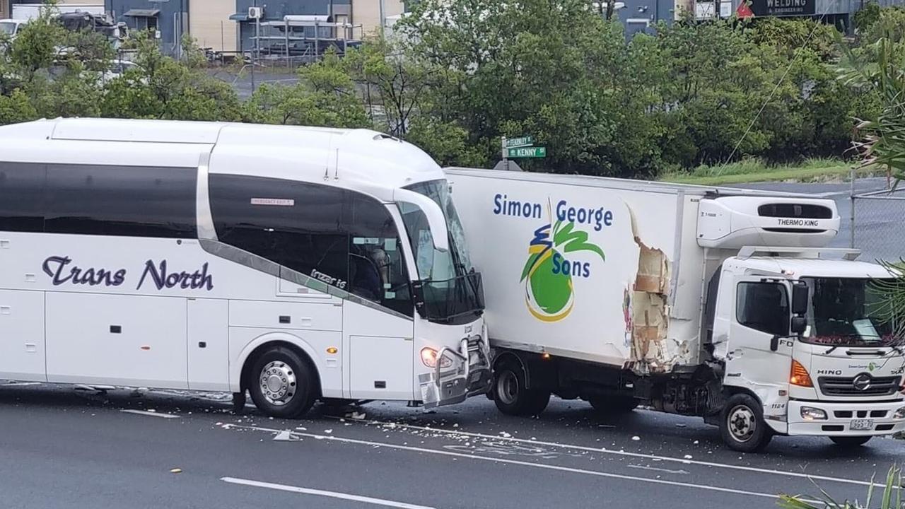 Paramedics and police at scene of bus and truck crash in Portsmith ...