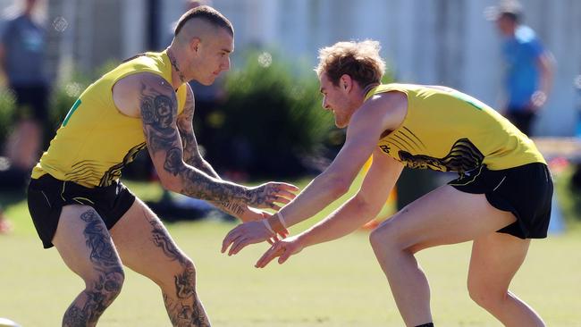 Dustin Martin and David Astbury train on the Gold Coast. Picture: Michael Klein