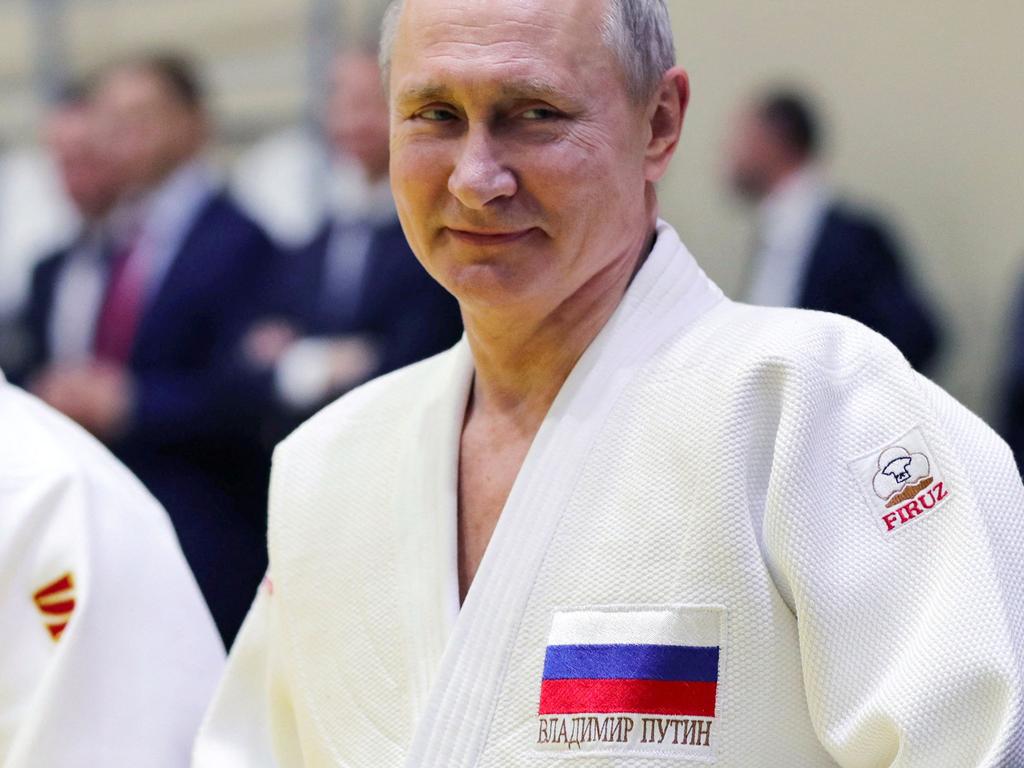 Vladimir Putin has been stripped of his honorary taekwondo black belt.