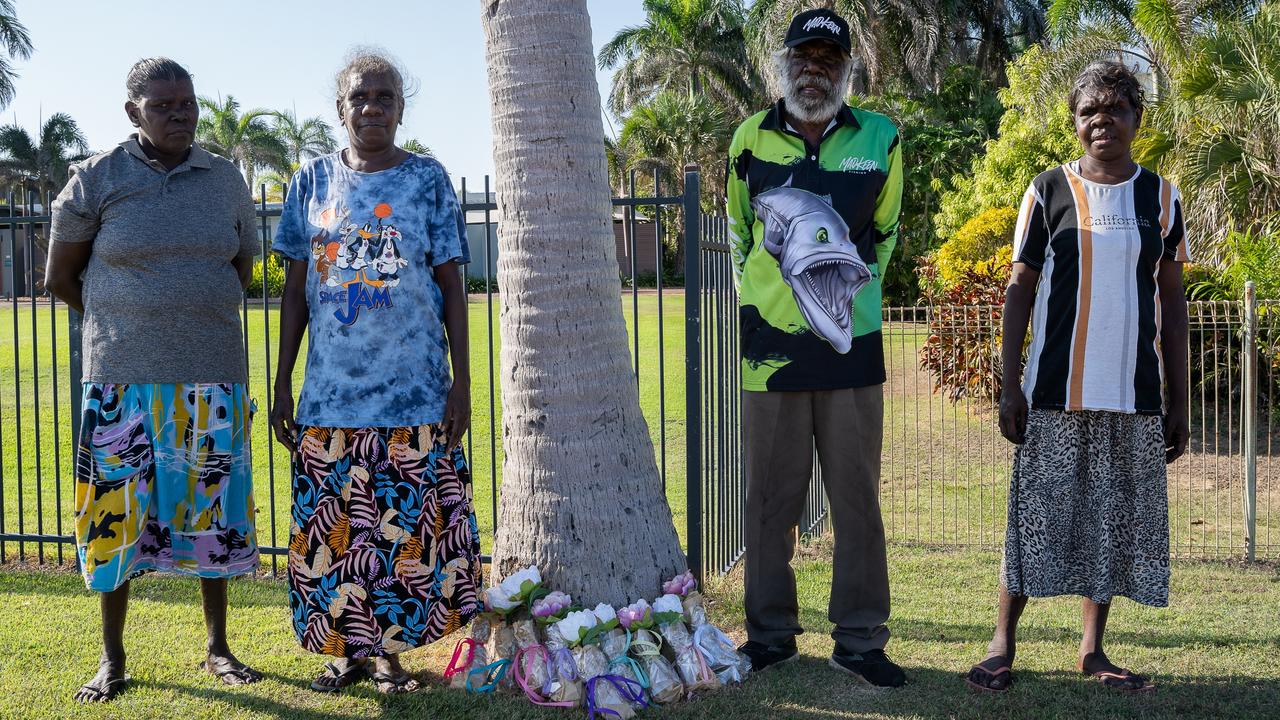 Karen Nardol, left, Ngeygo’s older sister Edna Midjarda, her father Tommy Madjalgaidj and her sister-cousin Agatina Bangalang at a ceremony at Mindil Beach, where on December 23 2019 Ngeygo Ragurrk was killed by her partner Garsek Nawirridj. Picture: Pema Tamang Pakhrin