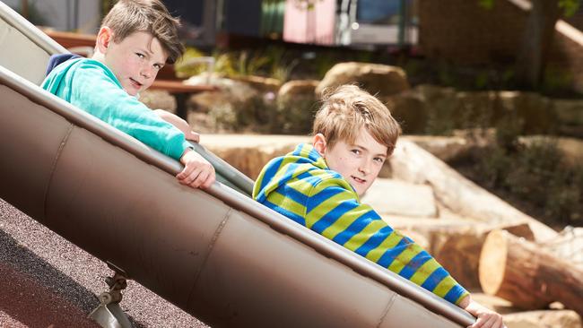 Brothers Kurtis and Tommy try out the new playground. Picture: Matt Loxton