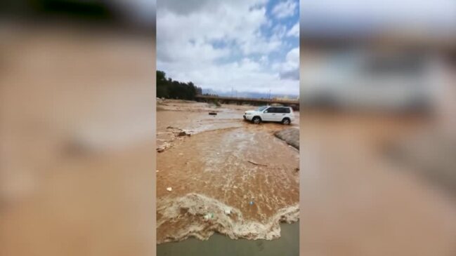 Water floods Oman streets after heavy rain