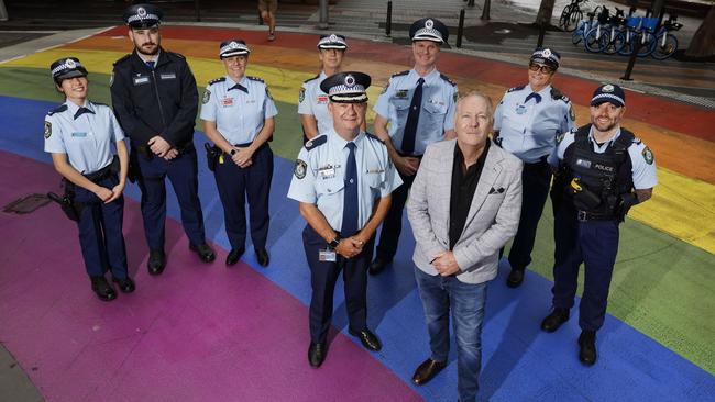 Assistant Police Commissioner Tony Cooke and former Police Commissioner Mick Fuller at the Taylor Square rainbow crossing in Darlington ahead of Mardi Gras. They are with police officers Jenny Zou, Jake Pattison, Martha Winch, Rachel Fawcett, Jon Beard, Ann Sidlo and Dominic Quinn. Picture: Richard Dobson