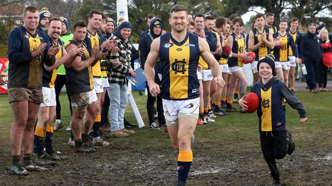 Daniel Keenan runs out for his 400th game. Picture: Hamish Blair