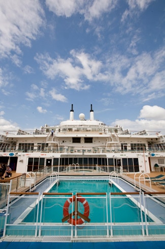 <p>The swimming pool onboard the Queen Mary 2. The cruise ship features 17 decks and towers about 62 metres above the waterline, equivalent to the height of a 23-storey building. It will be based in Australia for 2012.</p> <p>Picture: Charles Brewer</p>