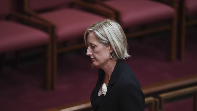 Labor Senator Katy Gallagher leaves after referring herself to the Court of Disputed Returns in the Senate chamber at Parliament House in Canberra, Wednesday, December 6, 2017. (AAP Image/Lukas Coch) NO ARCHIVING