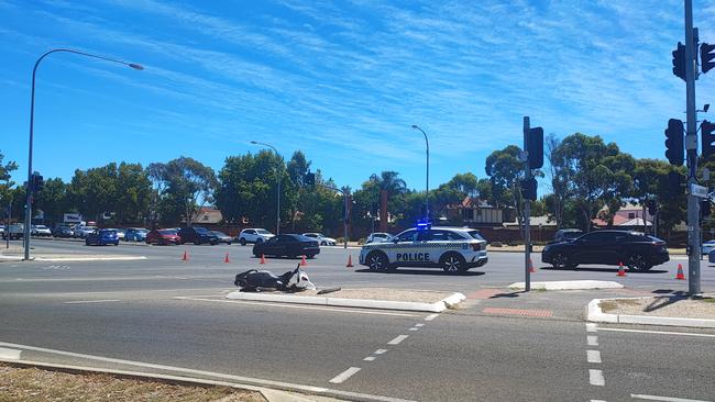 Emergency services were called about 12.50pm on Saturday to the crash between an car and a scooter.