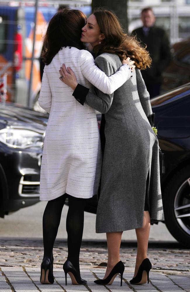 Kiss, kiss! A candid moment for Mary and Kate. Picture: Getty Images