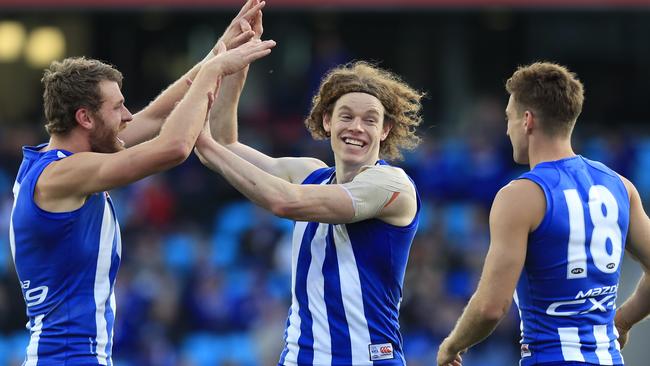 Ben Brown celebrates a goal for North Melbourne. Picture: AAP Images