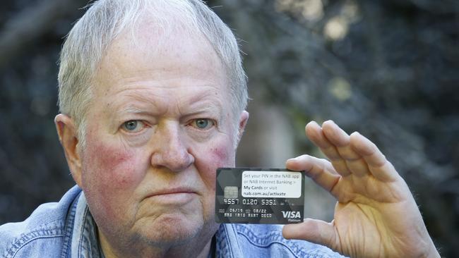 Bob Hart with the credit card issued to his wife Iris, who died 10 years ago. Picture: David Caird