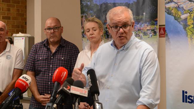 Lismore City Mayor Steve Krieg, National Recovery and Resilience Minister Bridget Mckenzie and Prime Minister Scott Morrison in Lismore City Council Chambers. Picture: Nicholas Rupolo