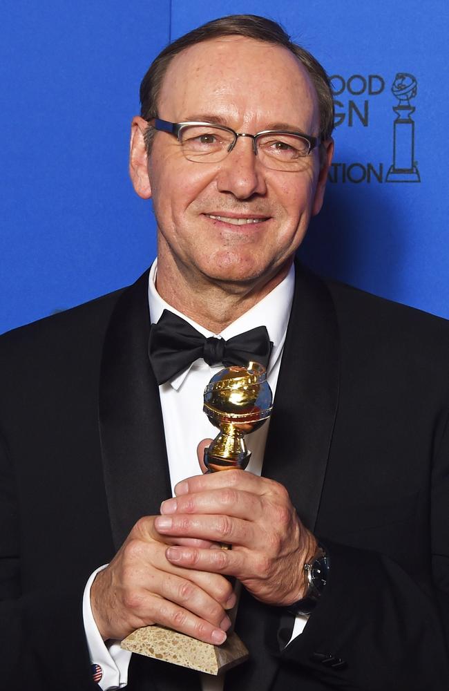 Finally ... actor Kevin Spacey poses with the award for Best Actor — TV Sereis, Drama for his role in House of Cards, at the 72nd annual Golden Globe Awards. Picture: AFP