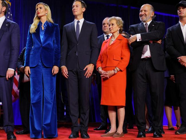 The Trump team on election night in Florida, including Linda McMahon, in red, and Howard Lutnick, to her right. Picture: Brian Snyder/Reuters