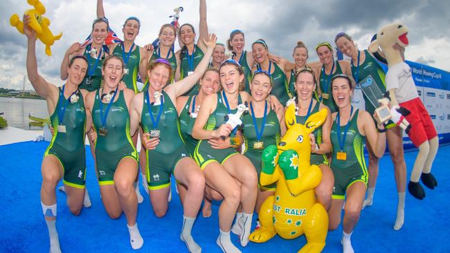 Australia’s women rowers celebrate after topping the medal tally at the World Cup in Poznan, the final international regatta before the Olympics. a