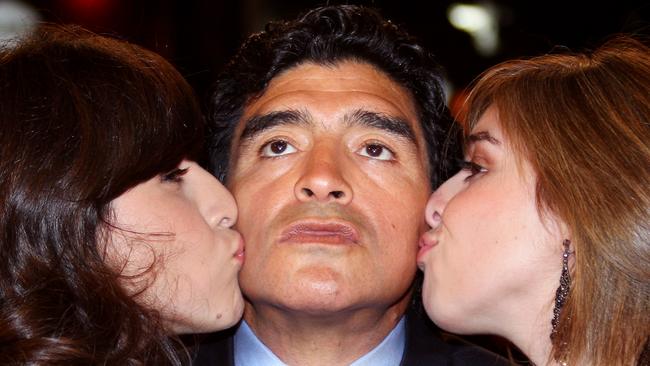 Diego Maradona with daughters Giannina, left, and Dalma at a screening of the documentary Maradona by Kusturica in Cannes, southern France, in 2008. Picture: AFP