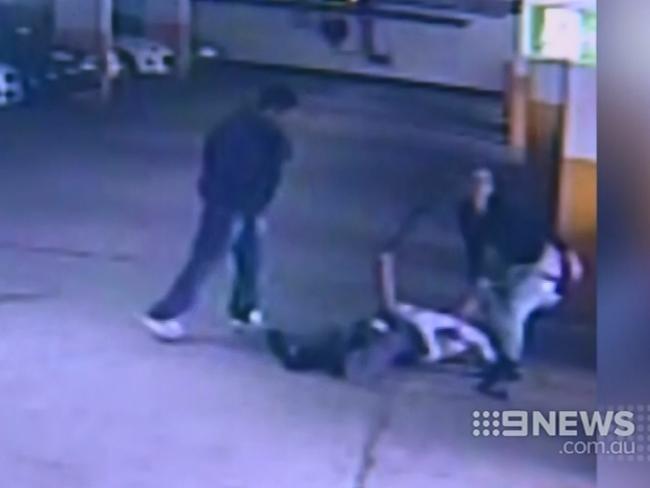 He is knocked to the ground and the woman goes for his pockets. Picture: Channel 9