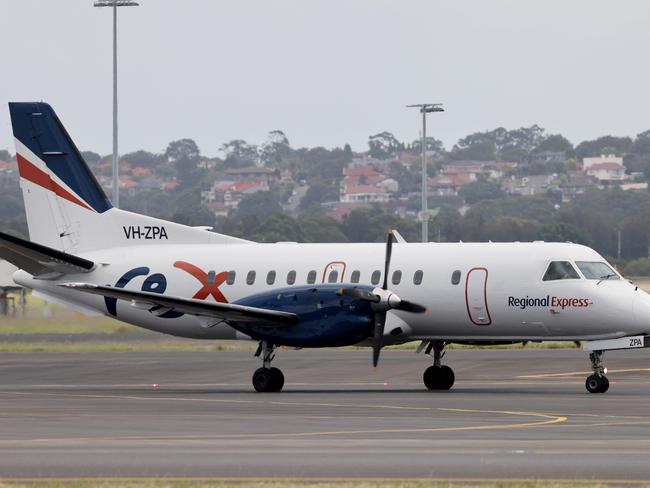 SYDNEY, AUSTRALIA - NewsWire Photos MARCH 10, 2021: A REX regional express plane pictured after landing at Sydney Airport.Picture: NCA NewsWire / Damian Shaw