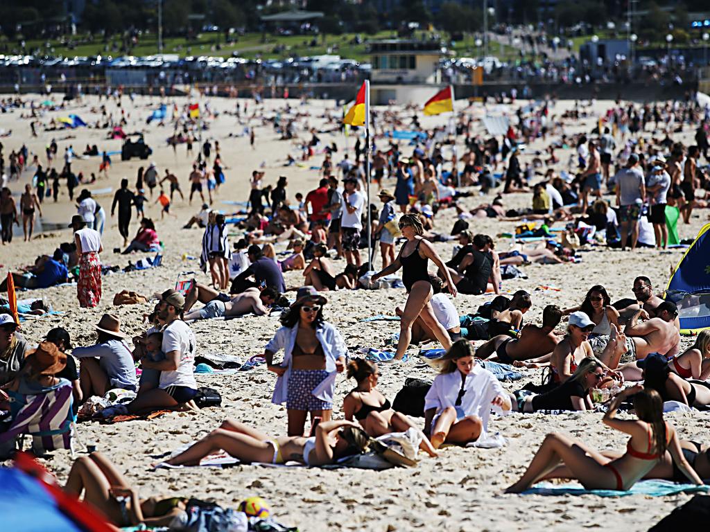 Beachgoers will have to keep a towel length between themselves and others. Picture: Jane Dempster/The Australian.