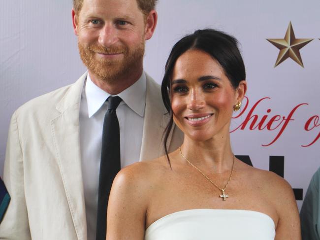 The Duchess of Sussex wears a cross pendant which was thought to have belonged to Diana, Princess of Wales. Picture: Getty Images