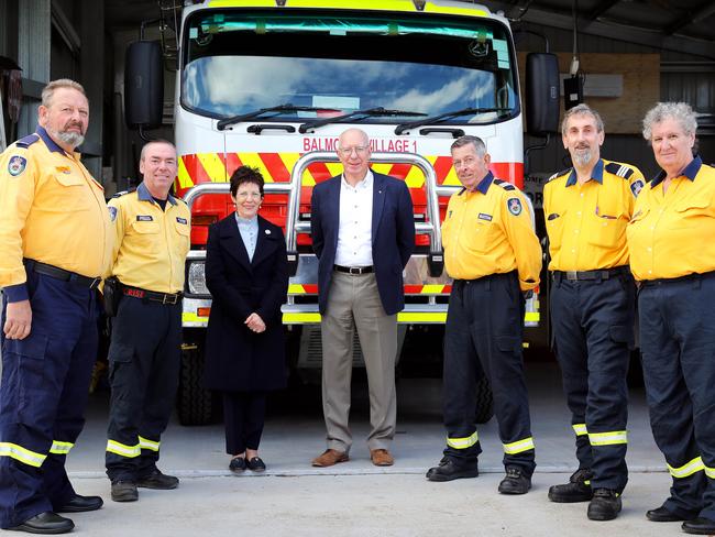 Volunteers — pictured here with Governor-General David Hurley and his wife Linda Hurley — should not be financially disadvantaged, the report said. Picture: Tim Hunter