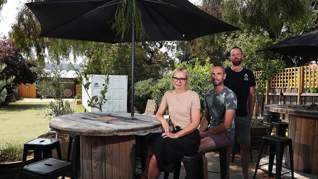 Jane and Phil Zakaria at front with co-owner Chris Cooper of Boodle Beasley. Boodle Beasley in North Hobart has been forced to shut down its beer garden over the Summer because Hobart City Council says it did not have the correct permits to operate. Picture: NIKKI DAVIS-JONES