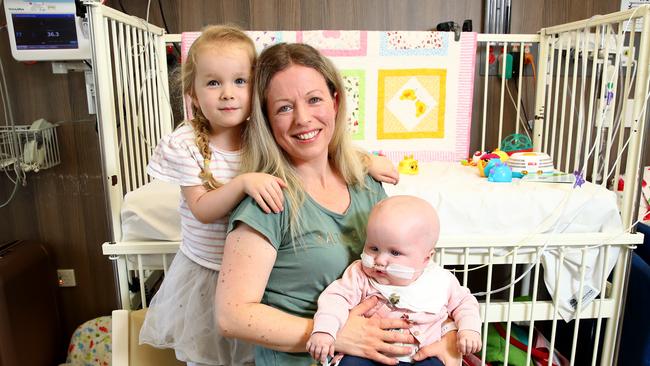 Christy Rae with 14-month old daughter Imogen and 4-year-old daughter Catya. Picture: Toby Zerna