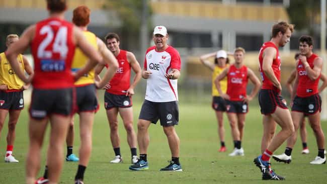 John Longmire barks instructions at Sydney training.