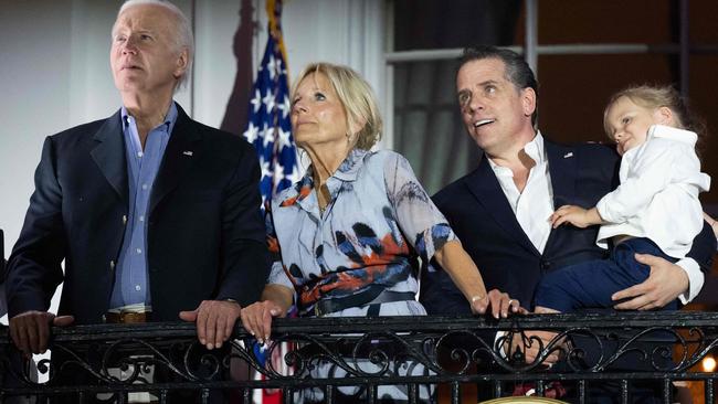 Joe Biden, First Lady Jill Biden and Hunter Biden with his son Beau watch the Independence Day fireworks display from the Truman Balcony of the White House. Picture: AFP.